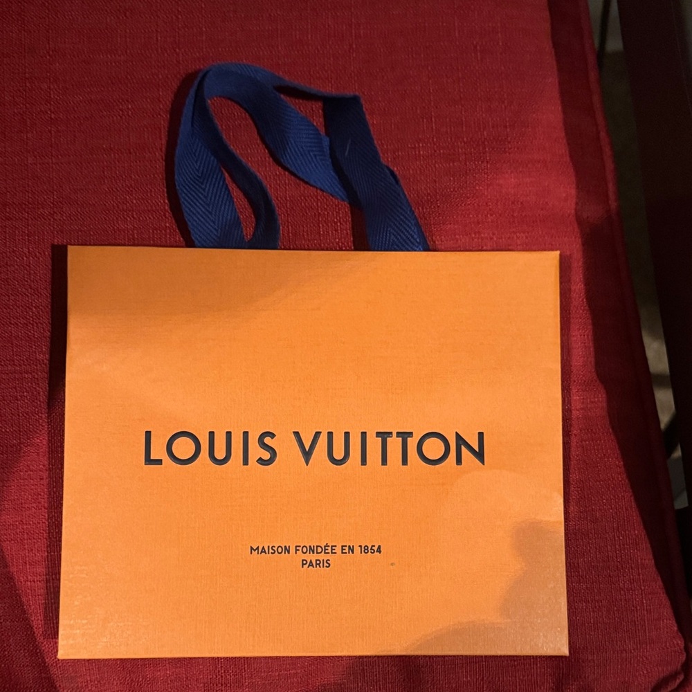 Louis Vuitton Vibrant Orange Bag with Blue Handles